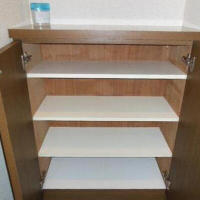 
						収納